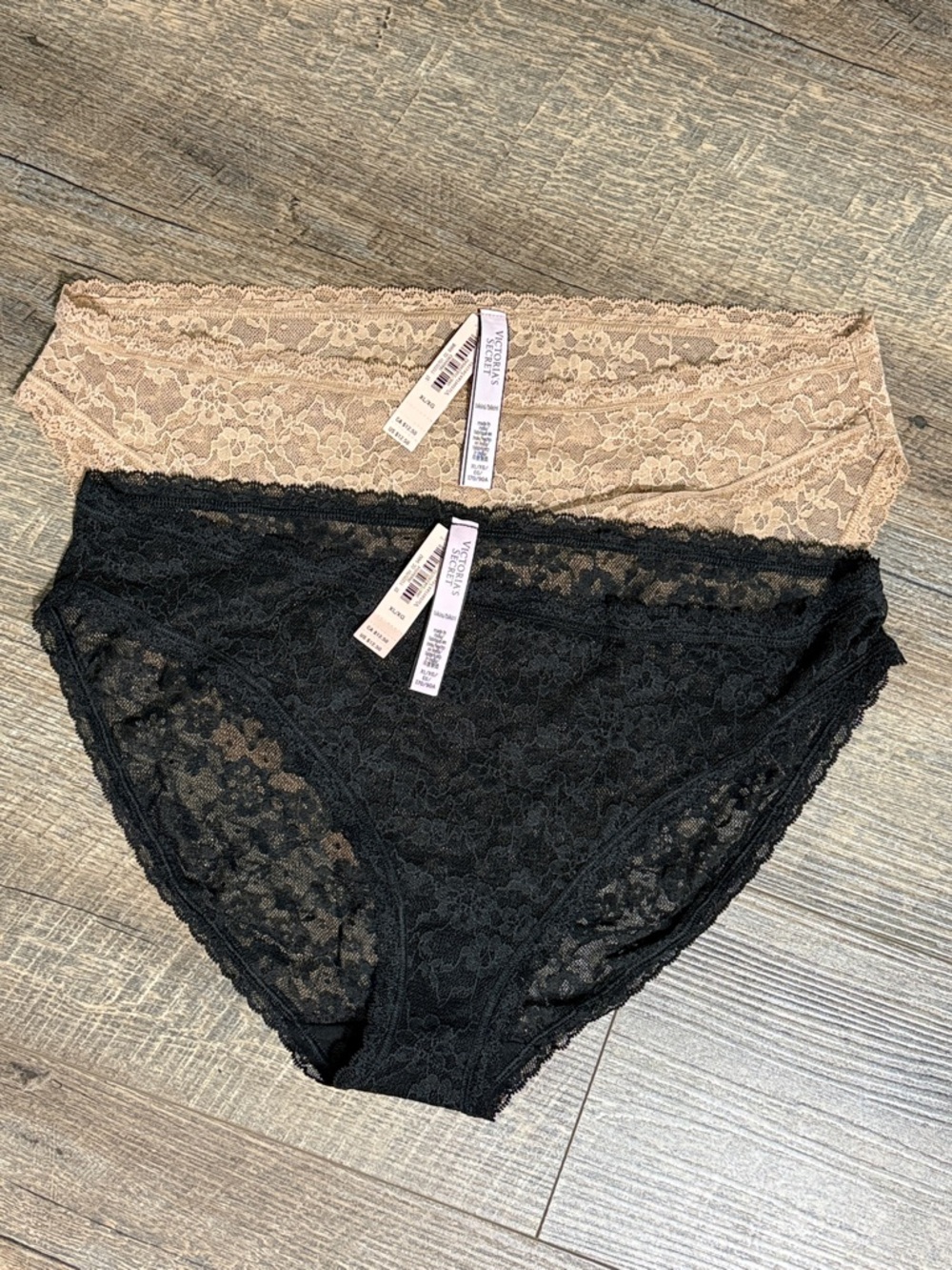 New with tags.  Victoria's Secret Lace Bikini Panty 2-Pack - Black & Nude Blush
